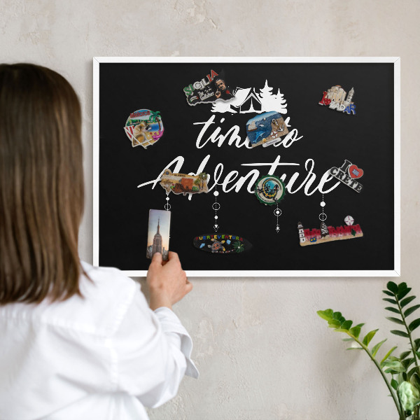 Decorative magnet board with a white frame Adventure awaits