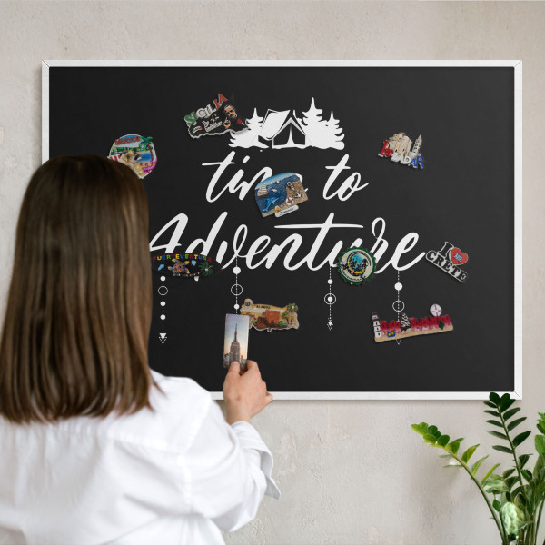 Decorative magnet board with a white frame Adventure awaits