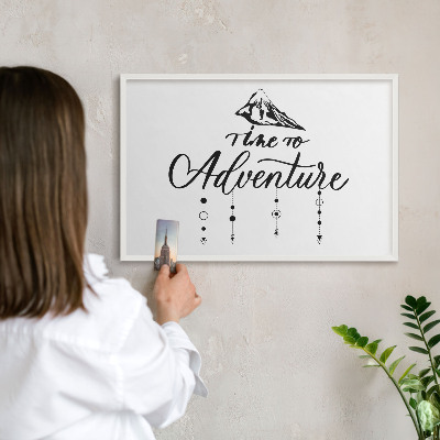 Magnetic board for travel magnets in a white frame Mountain adventure