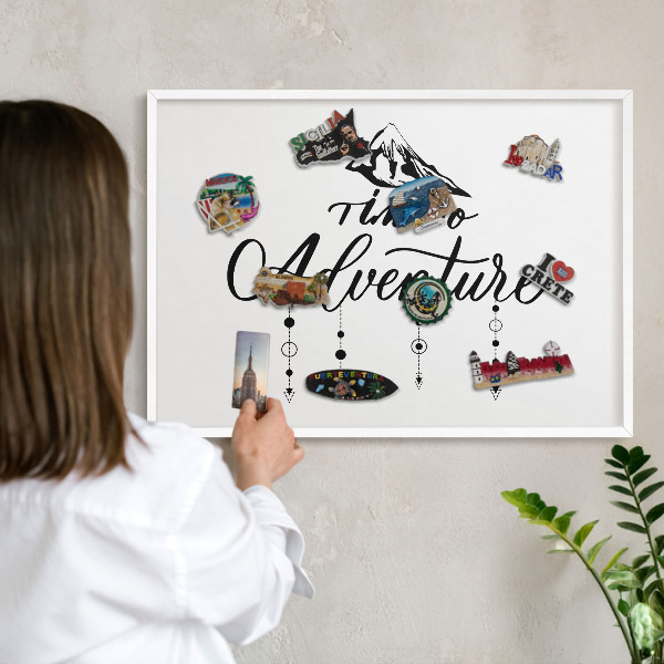 Magnetic board for travel magnets in a white frame Mountain adventure