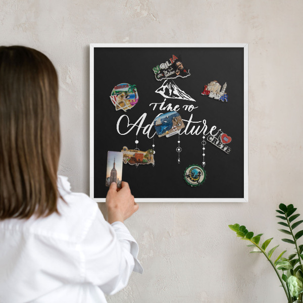 Decorative magnet board with a white frame Adventure awaits