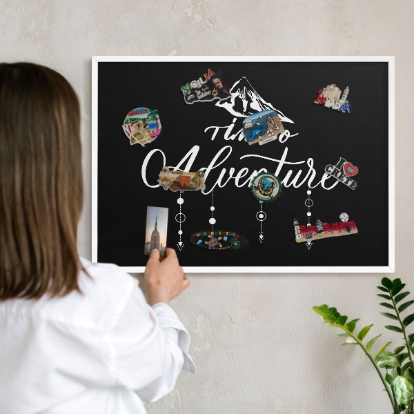 Decorative magnet board with a white frame Adventure awaits