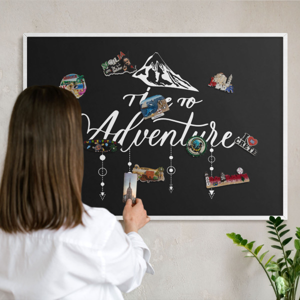 Decorative magnet board with a white frame Adventure awaits