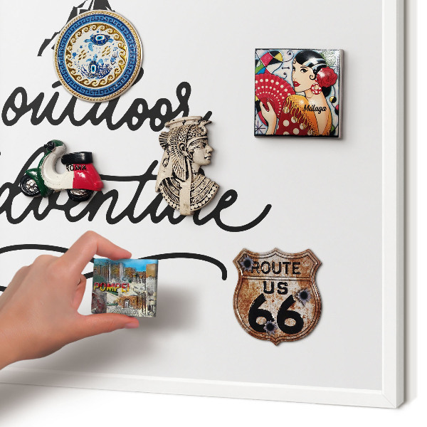 Magnetic board for travel magnets in a white frame Mountain adventure