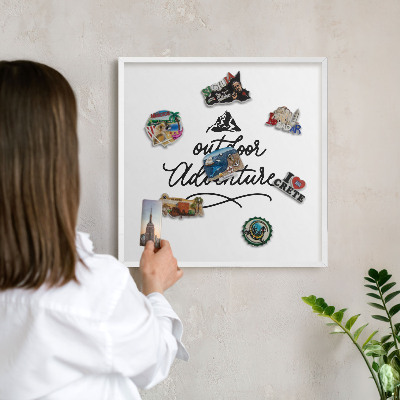 Magnetic board for travel magnets in a white frame Mountain adventure