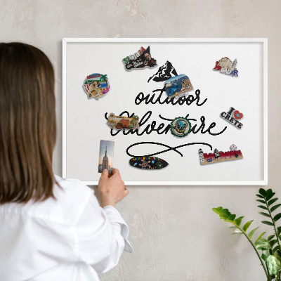 Magnetic board for travel magnets in a white frame Mountain adventure