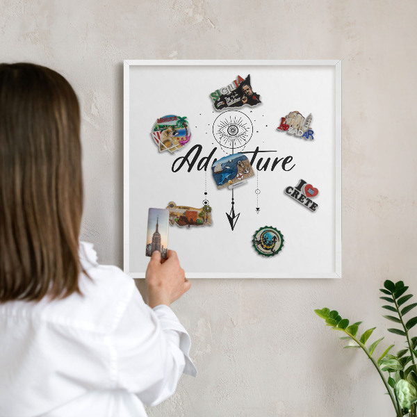Magnetic board for travel magnets in a white frame Adventure Theme