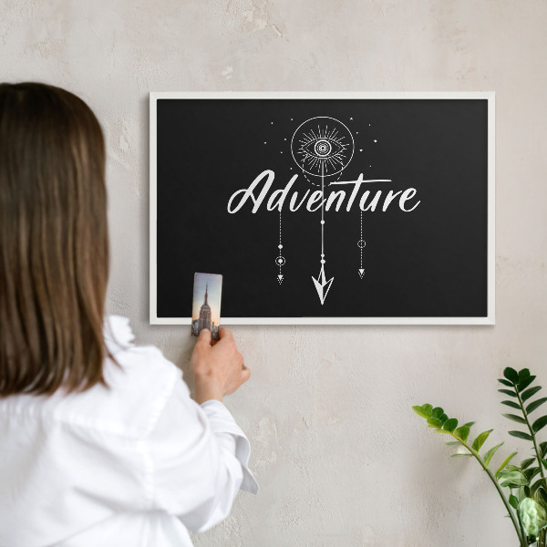 Decorative magnet board with a white frame Adventure awaits