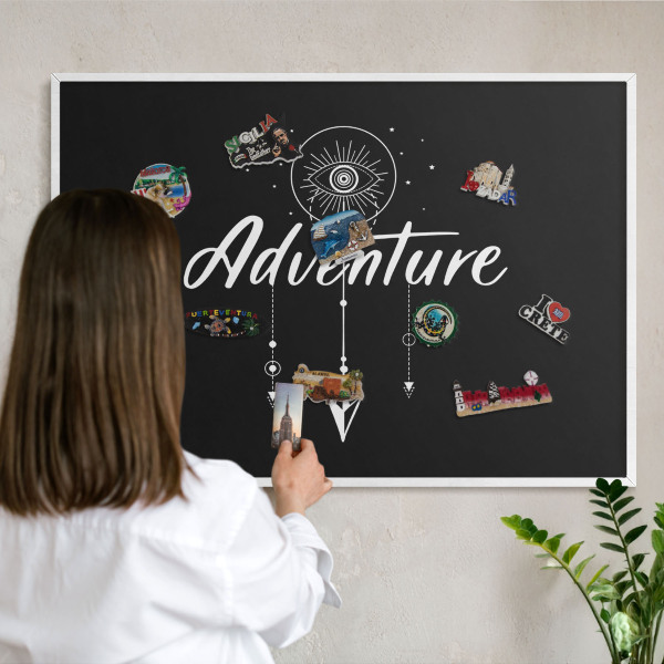 Decorative magnet board with a white frame Adventure awaits