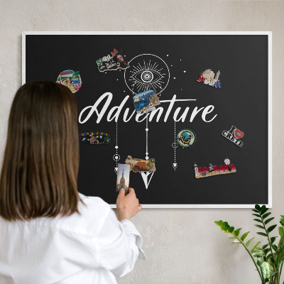 Decorative magnet board with a white frame Adventure awaits