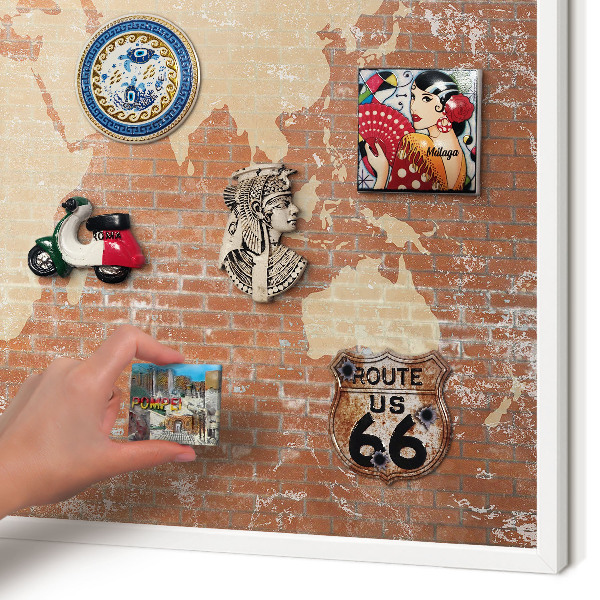 Decorative magnet board with a white frame Brick map