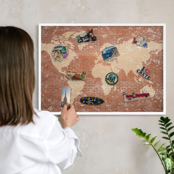 Decorative magnet board with a white frame Brick map