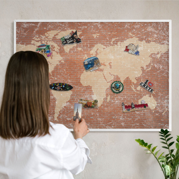 Decorative magnet board with a white frame Brick map