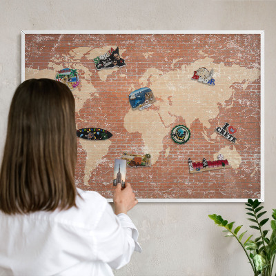 Decorative magnet board with a white frame Brick map