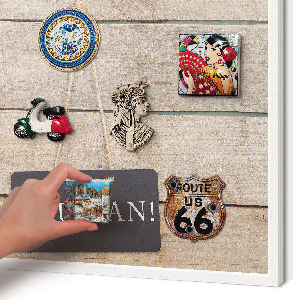Magnetic board for travel magnets in a white frame Motivation every day
