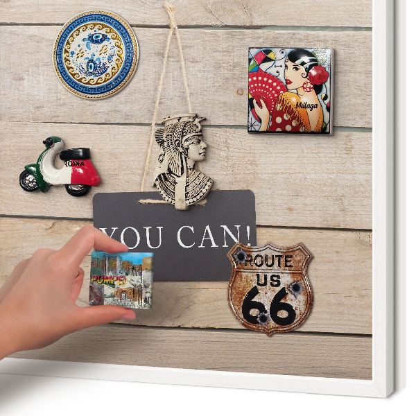 Magnetic board for travel magnets in a white frame Motivation every day
