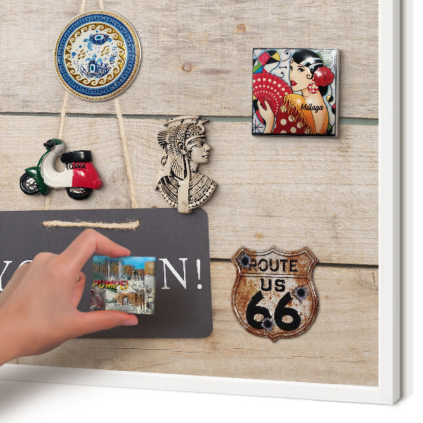 Magnetic board for travel magnets in a white frame Motivation every day
