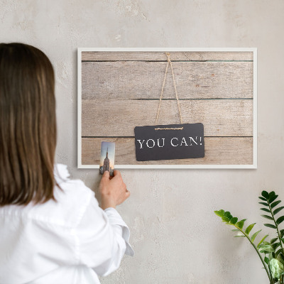 Magnetic board for travel magnets in a white frame Motivation every day