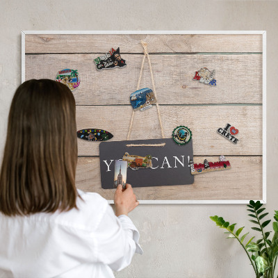 Magnetic board for travel magnets in a white frame Motivation every day