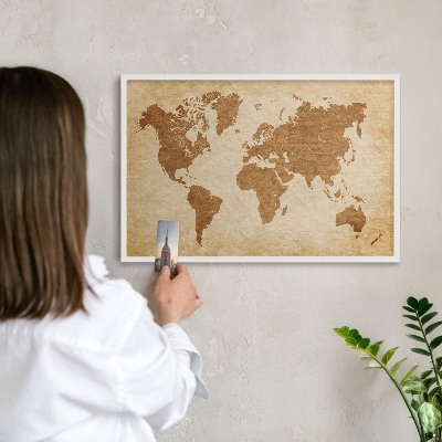 Decorative magnet board with a white frame Vintage map