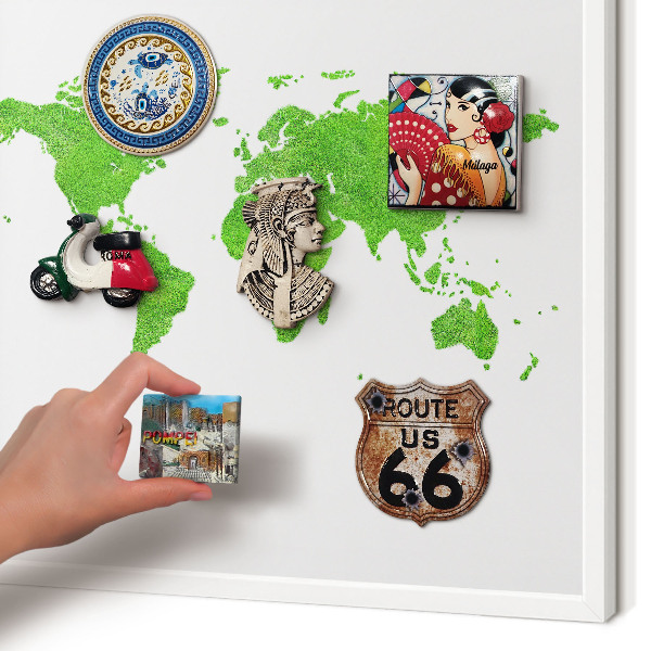 Magnetic board for travel magnets in a white frame Green map