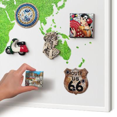 Magnetic board for travel magnets in a white frame Green map