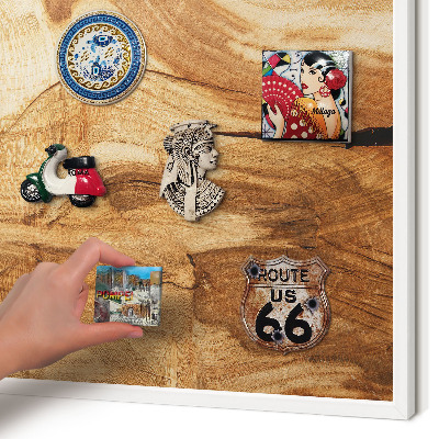 Magnetic board for travel magnets in a white frame Natural wood