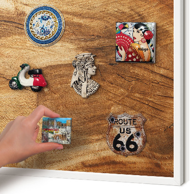 Magnetic board for travel magnets in a white frame Natural wood