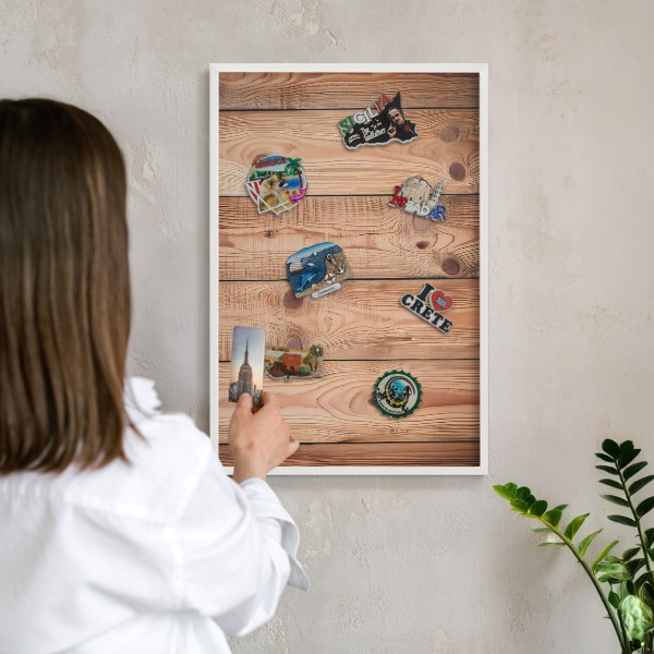 Decorative magnet board with a white frame Wooden boards