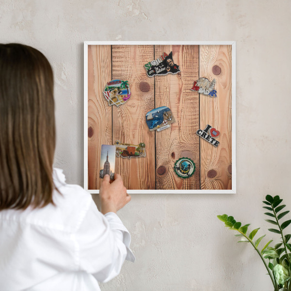 Decorative magnet board with a white frame Wooden boards