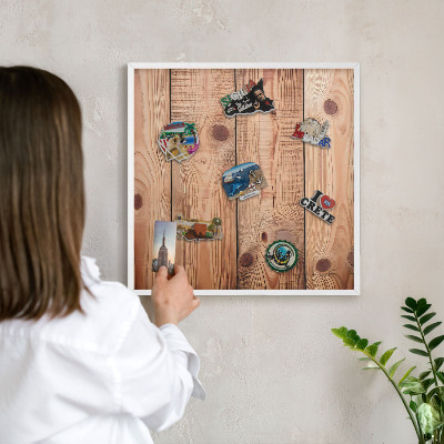 Decorative magnet board with a white frame Wooden boards