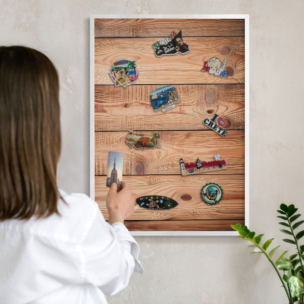 Decorative magnet board with a white frame Wooden boards