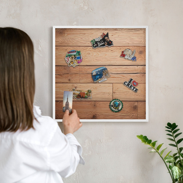Magnetic board for travel magnets in a white frame Wooden boards