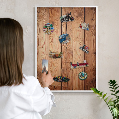 Magnetic board for travel magnets in a white frame Wooden boards