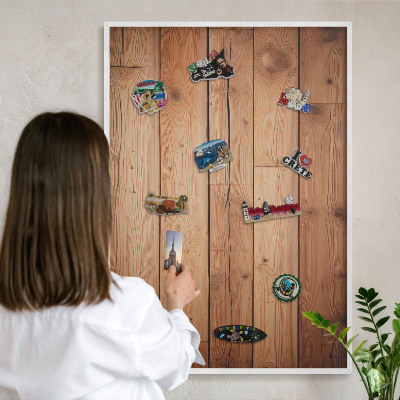 Magnetic board for travel magnets in a white frame Wooden boards