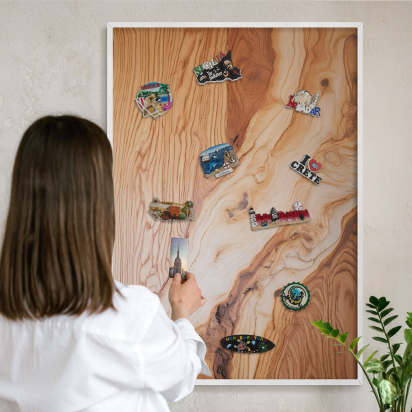 Magnetic board for travel magnets in a white frame Wooden texture