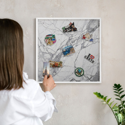 Magnetic board for travel magnets in a white frame Marble elegance