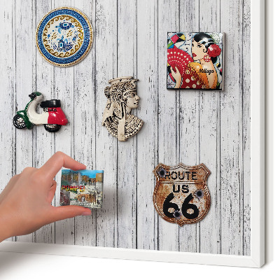 Magnetic board for travel magnets in a white frame Light wood