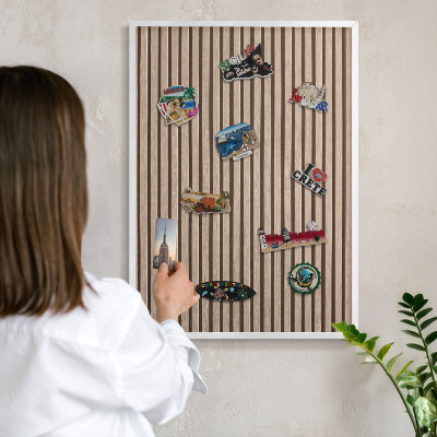 Magnetic board for travel magnets in a white frame Calm structure