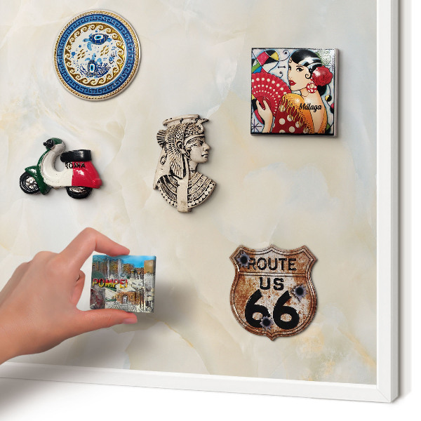 Magnetic board for travel magnets in a white frame Subtle elegance