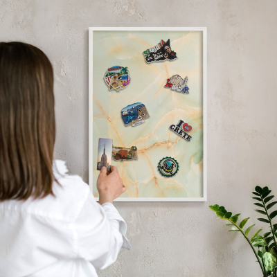 Magnetic board for travel magnets in a white frame Marble elegance