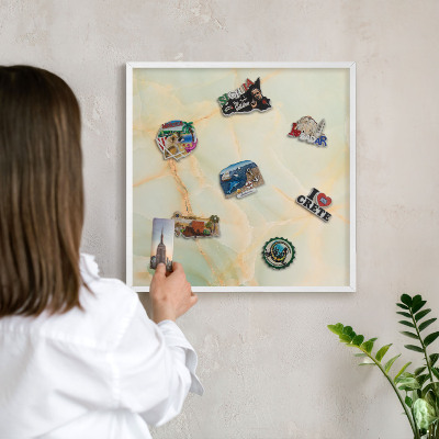 Magnetic board for travel magnets in a white frame Marble elegance