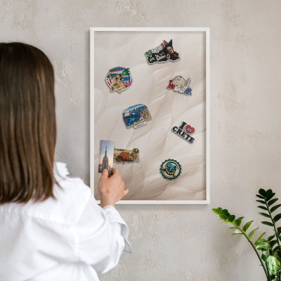 Magnetic board for travel magnets in a white frame Cream feathers