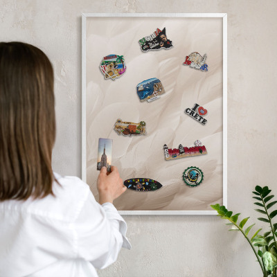 Magnetic board for travel magnets in a white frame Cream feathers