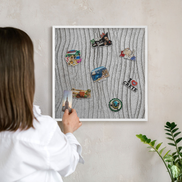 Magnetic board for travel magnets in a white frame Gray waves
