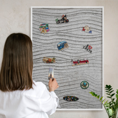 Magnetic board for travel magnets in a white frame Gray waves