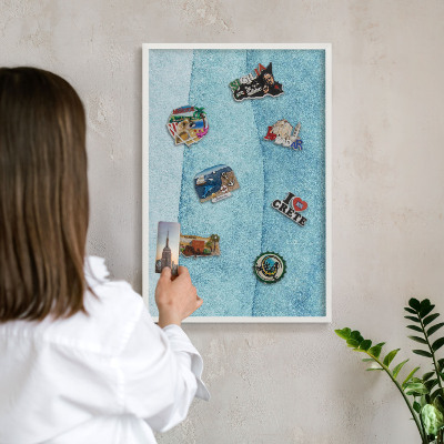 Decorative magnet board with a white frame Blue waves