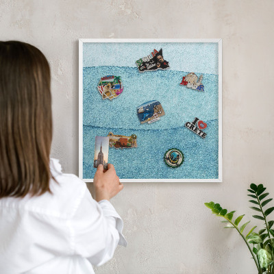 Decorative magnet board with a white frame Blue waves