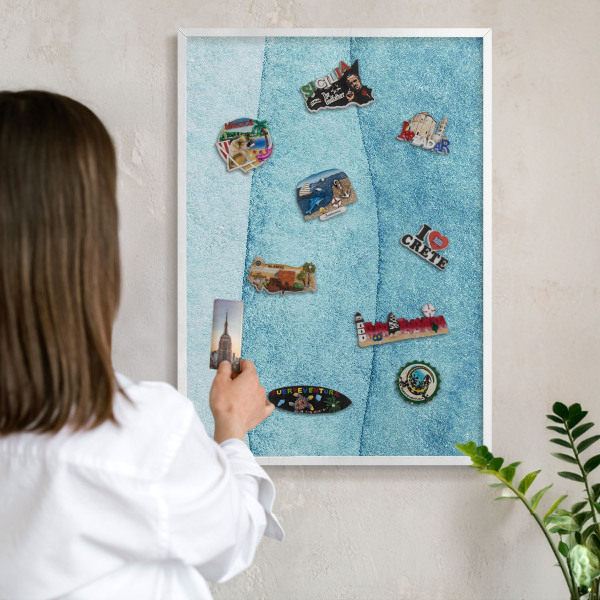 Decorative magnet board with a white frame Blue waves