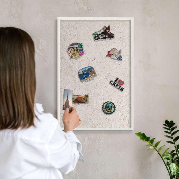 Decorative magnet board with a white frame Delicate background